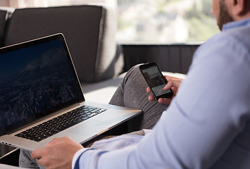 Image showing man working from home