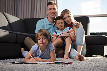 Image showing young couple spending time with kids