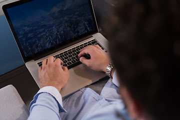 Image showing man working from home