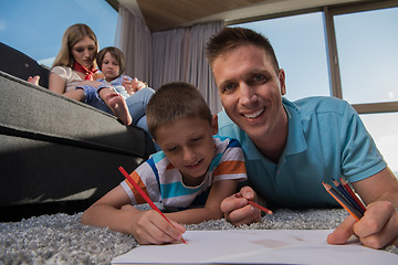 Image showing young couple spending time with kids