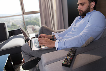 Image showing man working from home