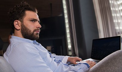 Image showing man working from home