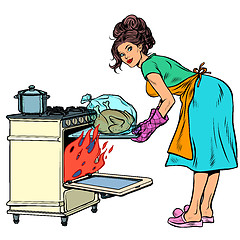 Image showing Woman housewife bakes bird in the oven