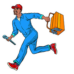 Image showing Male African master repairman runs