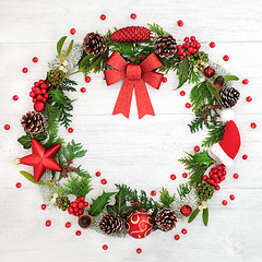 Image showing Christmas Wreath with Red Bow and Winter Flora