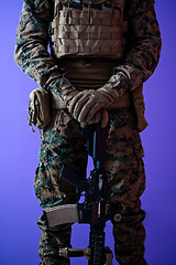 Image showing modern warfare soldier purple backgorund