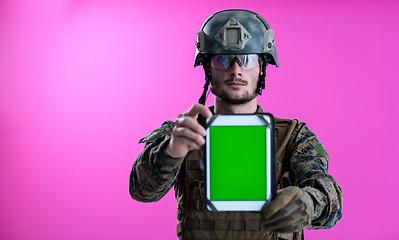 Image showing soldier showing a tablet with a blank green screen