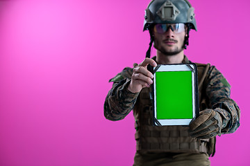 Image showing soldier showing a tablet with a blank green screen