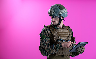Image showing soldier using tablet computer closeup
