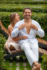 Image showing joyful future young father and pregnant woman