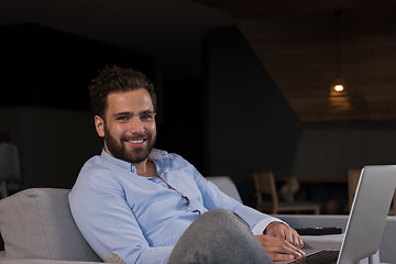 Image showing man working from home