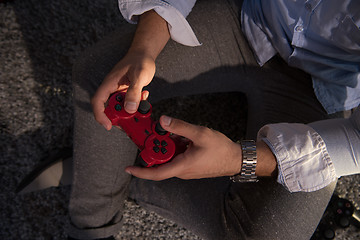 Image showing Happy family playing a video game