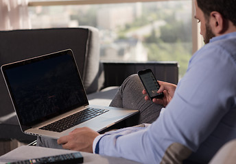 Image showing man working from home