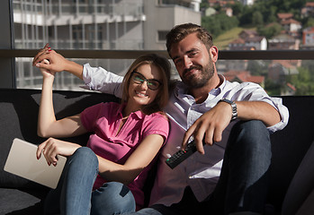 Image showing Young couple watching television