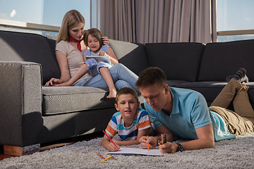 Image showing young couple spending time with kids