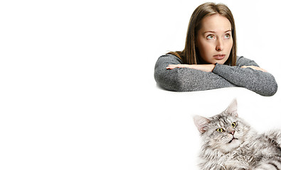 Image showing Woman with her cat over white background