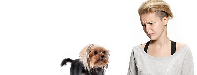 Image showing Woman with her dog on leash over white background