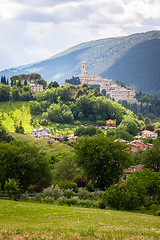 Image showing Camerino in Italy Marche over colourful fields