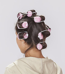 Image showing Woman with Curlers