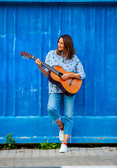 Image showing woman with a guitar 