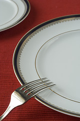 Image showing fork and plates in perspective