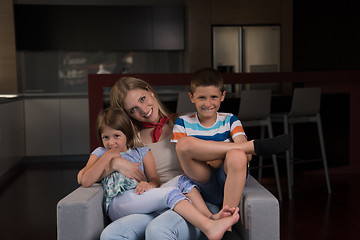 Image showing young mother spending time with kids