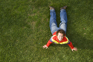 Image showing  exercising on the grass
