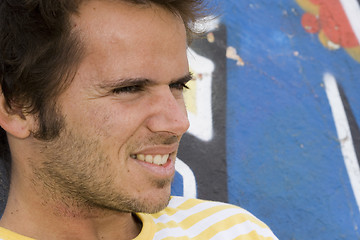 Image showing young men looking away