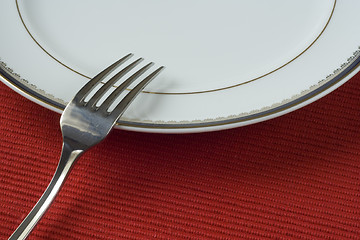 Image showing fork and porcelain plate
