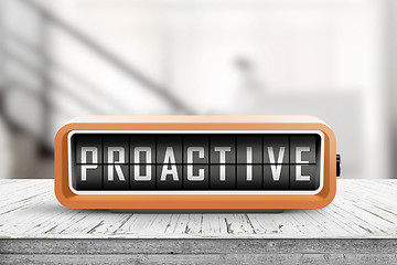 Image showing Proactive sign in the shape of a retro device