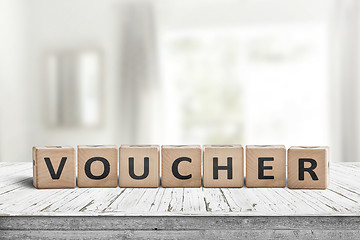 Image showing Voucher sign in a bright room