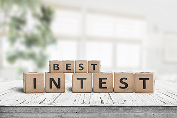 Image showing Best in test sign on a wooden table
