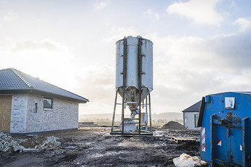 Image showing Silo at a construction area with new houses