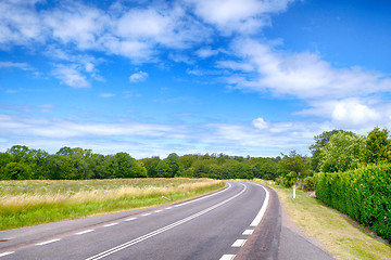 Image showing Curvy road under a blue sky in the summer