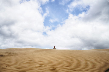 Image showing Lighthouse buried in a large sand dune