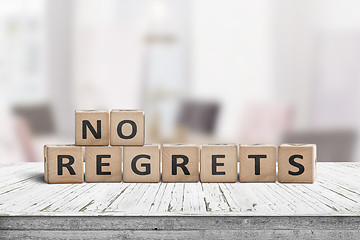 Image showing No regrets sign made with wooden blocks