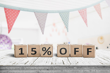 Image showing Special price 15 percent off promotion sign