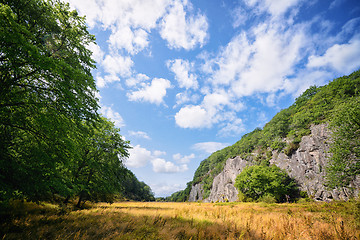 Image showing Rural landscape with cliffs and dry fields