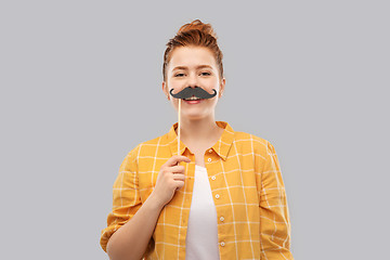 Image showing red haired teenage girl with black moustaches