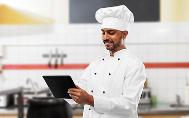 Image showing indian chef with tablet pc at restaurant kitchen