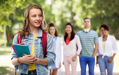 Image showing happy smiling teenage student girl with school bag