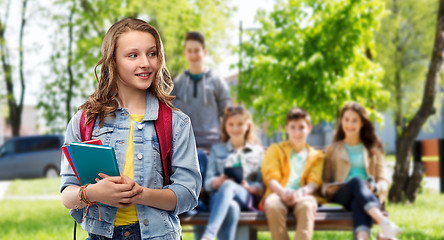 Image showing happy smiling teenage student girl with school bag