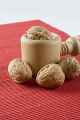 Image showing Walnuts in a nutcracker 