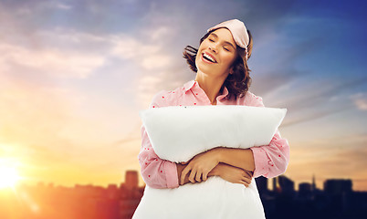 Image showing woman with pillow in pajama and eye sleeping mask