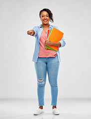 Image showing african american student woman with notebooks