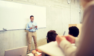 Image showing group of students and teacher at lecture