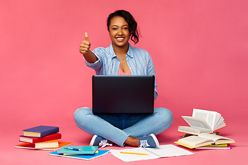 Image showing happy african american student woman with laptop