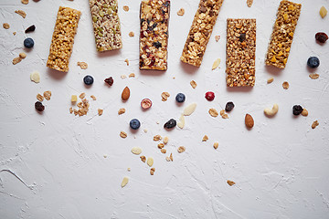 Image showing Homemade gluten free granola bars with mixed nuts, seeds, dried fruits