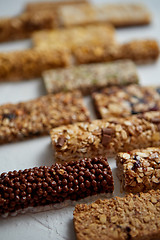 Image showing Homemade gluten free granola bars with mixed nuts, seeds, dried fruits