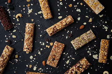 Image showing Mixed gluten free granola cereal energy bars. With dried fruits and nuts
